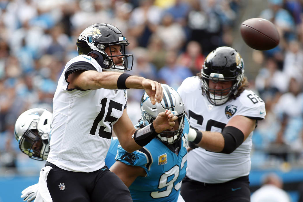 Jacksonville Jaguars quarterback Gardner Minshew (15) passes against the Carolina Panthers duri ...