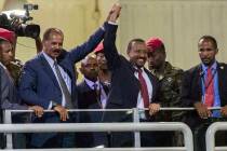 In a July 15, 2018, file photo, Eritrean President Isaias Afwerki, second left, and Ethiopia's ...