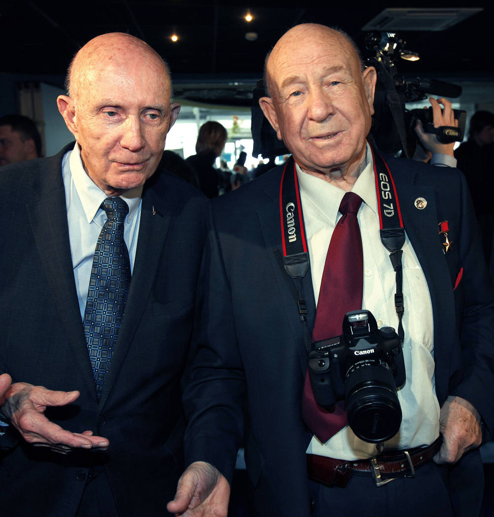 FILE - In this Monday, April 11, 2011 file photo, retired NASA astronaut Thomas Stafford, left, ...