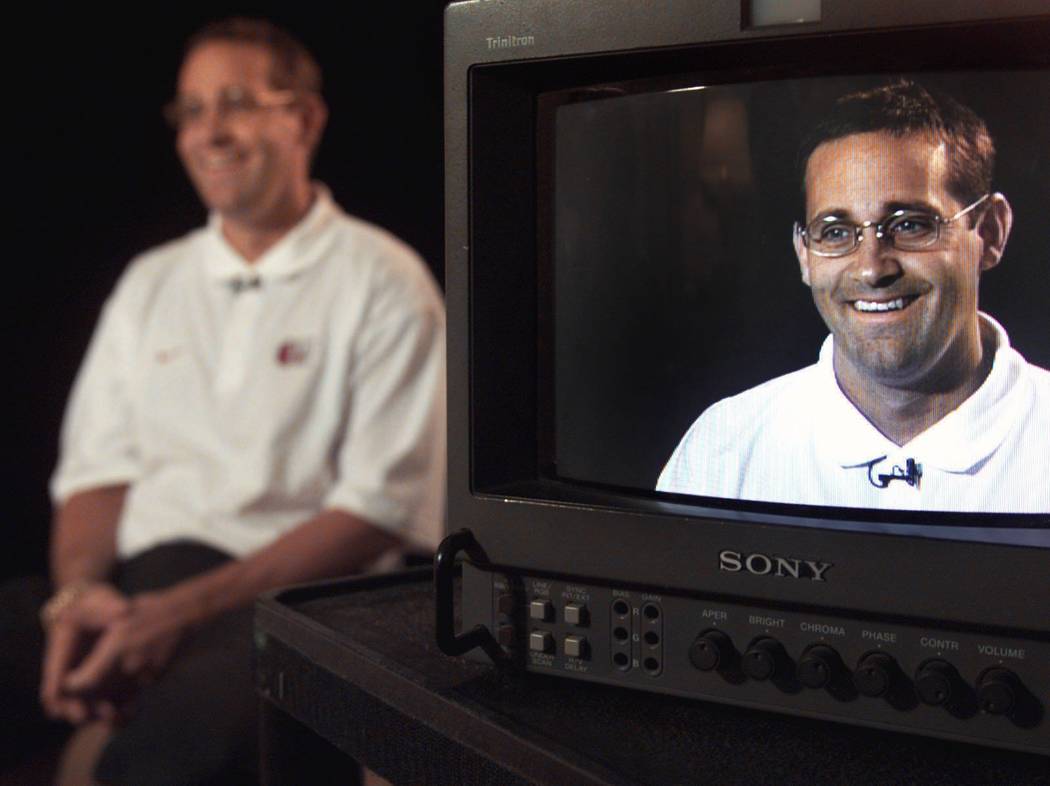 UNLV basketball coach Bill Bayno laughs after being asked how it feels being one of the older c ...