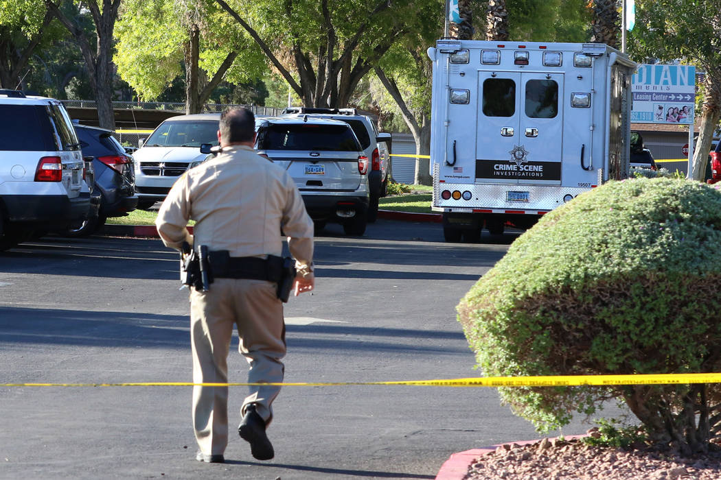 Las Vegas police investigate a shooting death at an apartment complex in the 4200 block of West ...