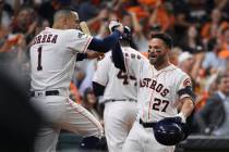 Houston Astros second baseman Jose Altuve (27) celebrates his solo home run against the Tampa B ...