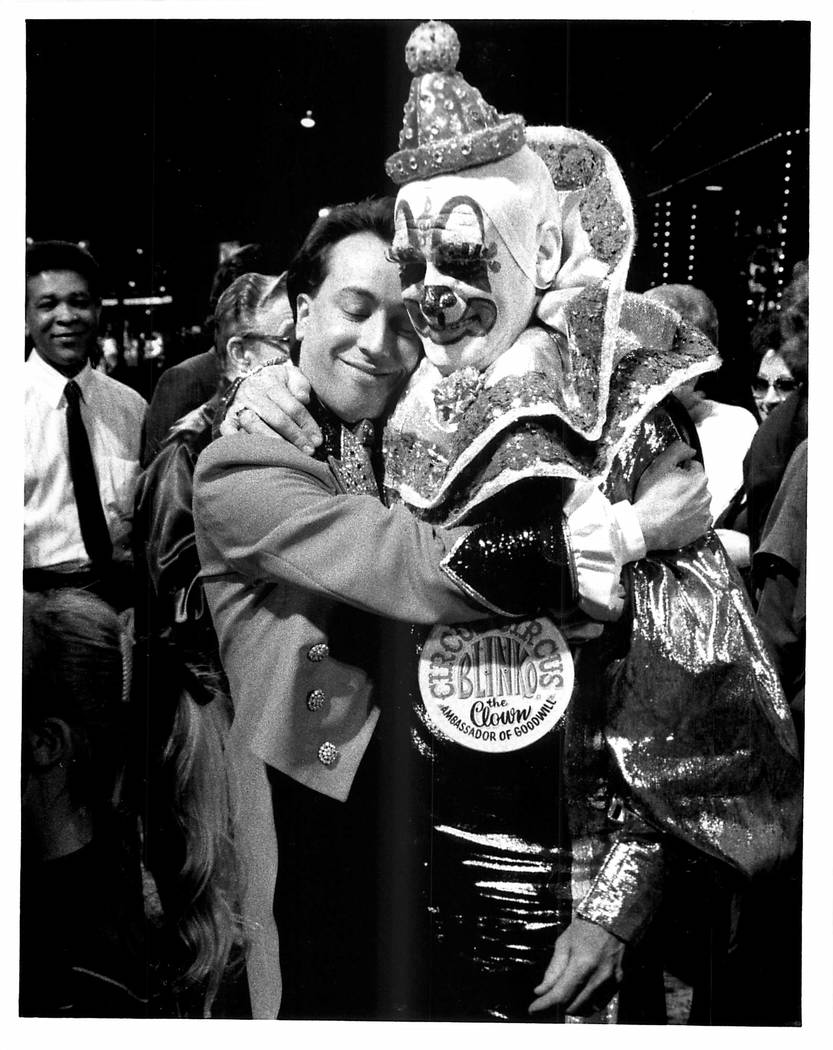 Blinko the Circus Circus Clown is retiring and gets hug from circus master on March 29, 1990 (L ...