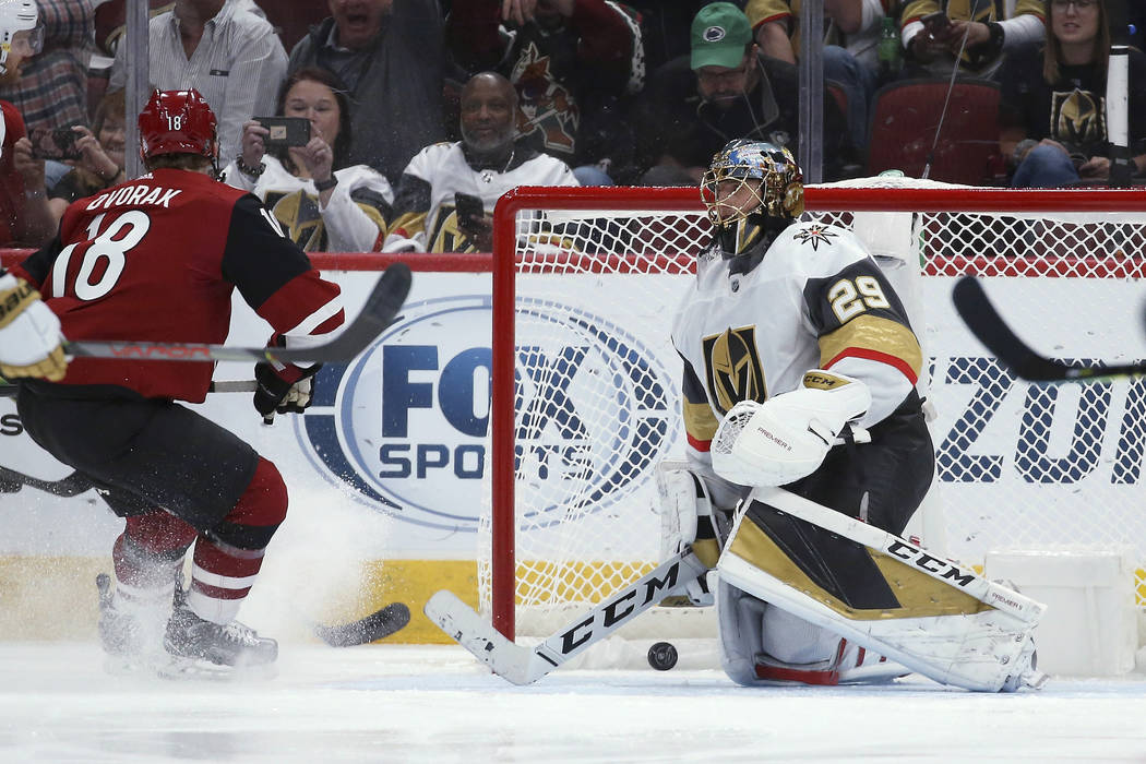 Vegas Golden Knights goaltender Marc-Andre Fleury (29) gives up a goal to Arizona Coyotes' Cono ...