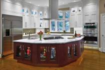 This kitchen has lighting that fits all needs, including accent, showcase, task and natural. (G ...
