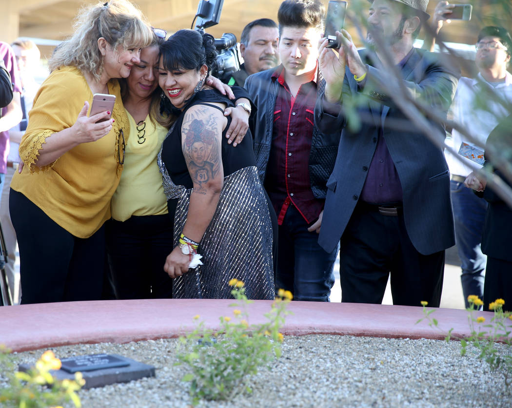 Angelica Cervantes, mother of Erick Silva, a security guard who was shot trying to help people ...