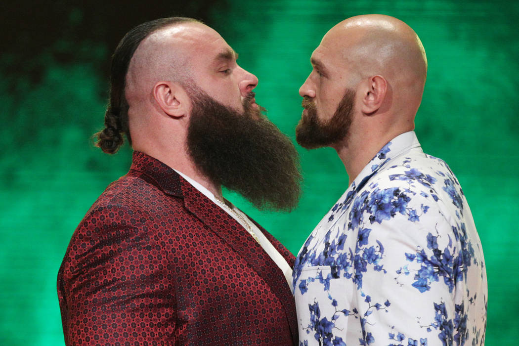 Braun Strowman, left, with Tyson Fury, pose during a World Wrestling Entertainment press confer ...