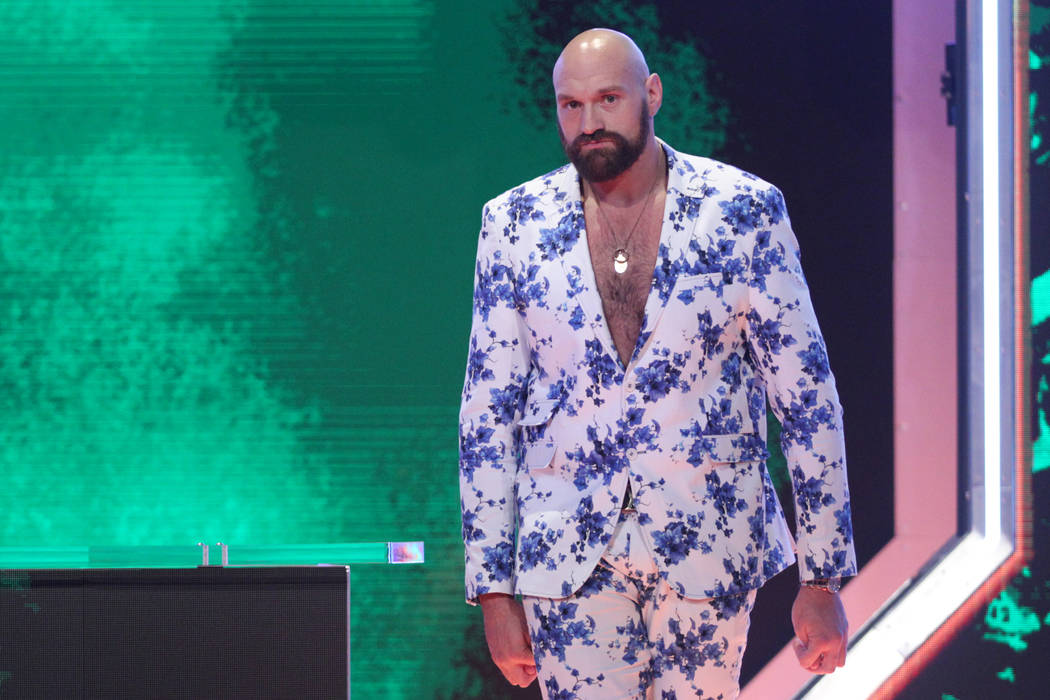 Tyson Fury poses during a World Wrestling Entertainment press conference at T-Mobile Arena in L ...