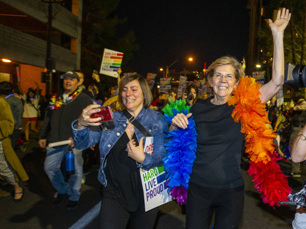 Democratic presidential candidate Sen. Elizabeth Warren, D-Mass., marching in the Pride parade ...