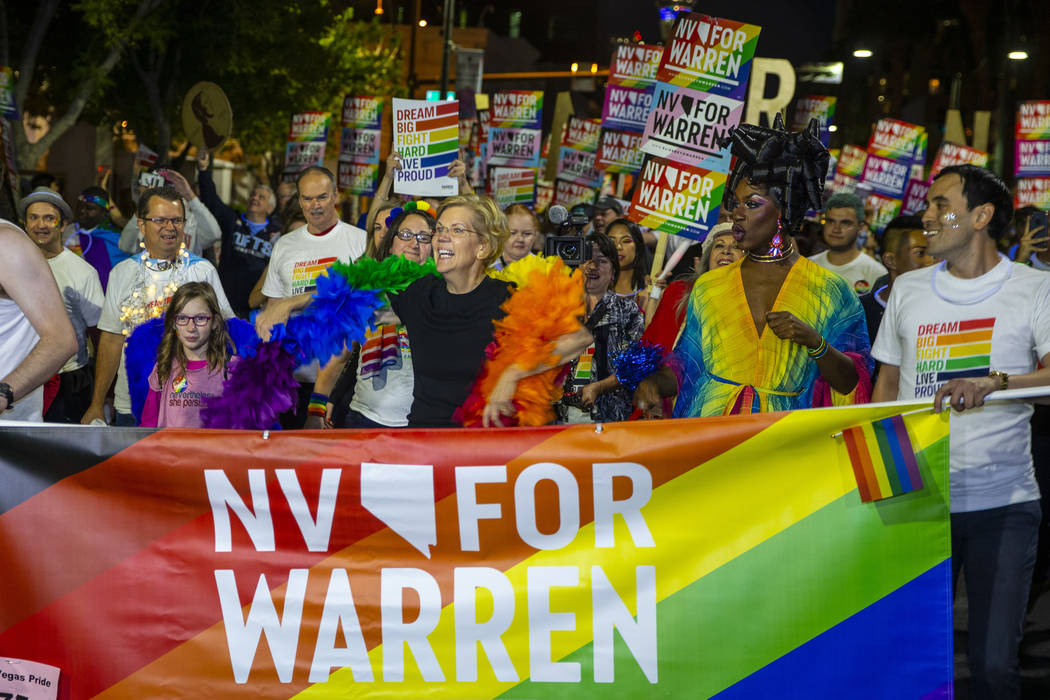 Democratic presidential candidate Sen. Elizabeth Warren, D-Mass., marching in the Pride parade ...