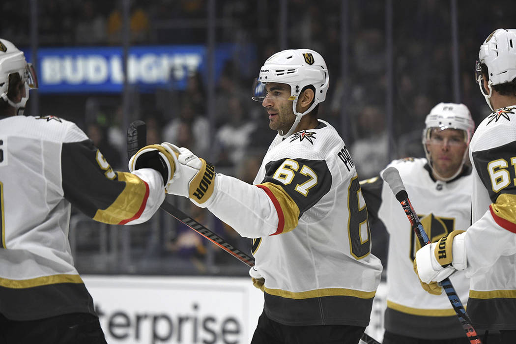 Vegas Golden Knights left wing Max Pacioretty (67) is congratulated after scoring against the L ...