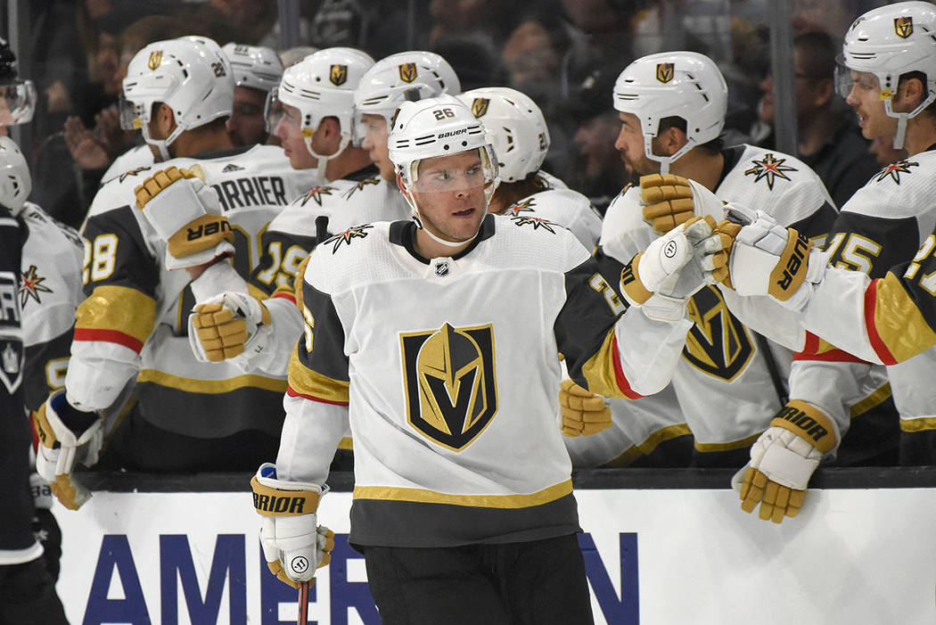 Vegas Golden Knights center Paul Stastny, center, is congratulated after scoring against the Lo ...