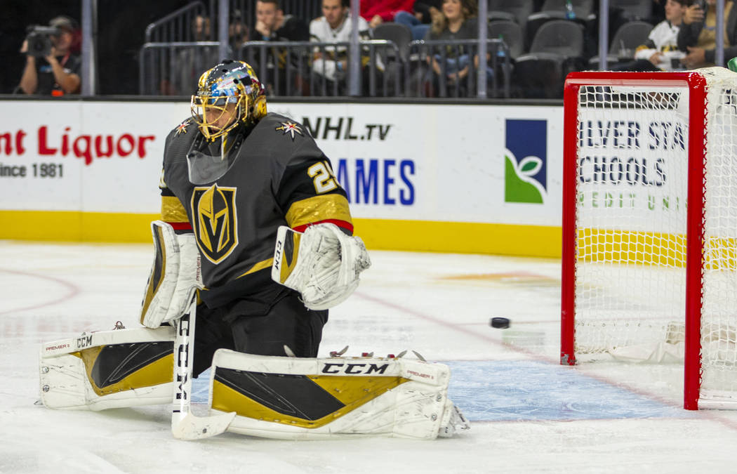 Vegas Golden Knights goaltender Marc-Andre Fleury (29) has a puck get past into the net by the ...