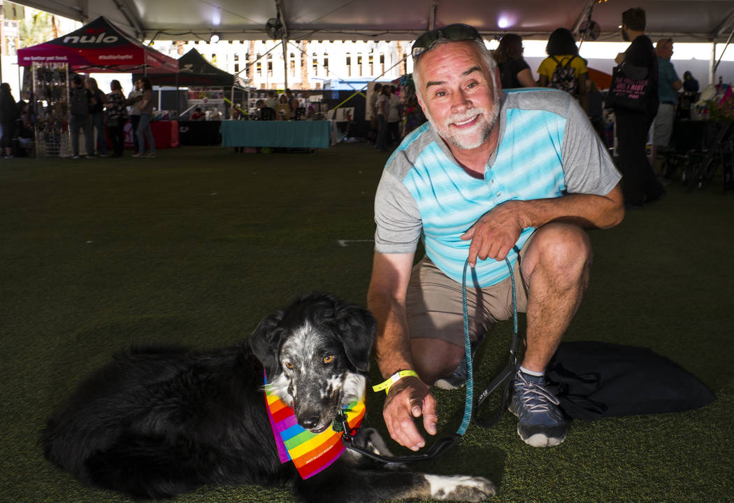 David Wood, of St. George, Utah, poses with Pepper, an Australian shepherd and border collie mi ...