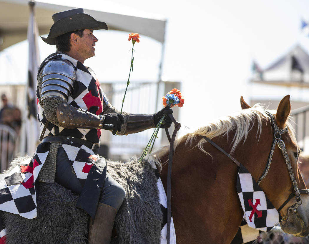 Sir Anthony the Black Knight looks to give flowers to maidens enjoying the battles taking place ...