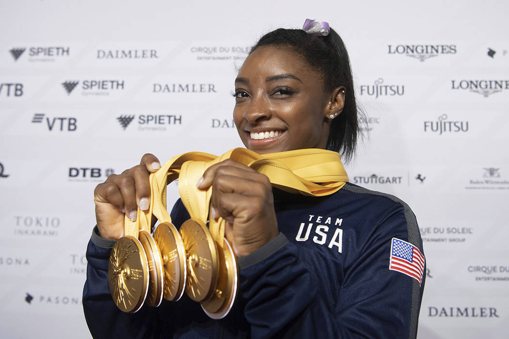Simone Biles sets alltime medal record at gymnastics worlds Sports