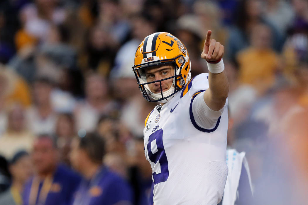 LSU quarterback Joe Burrow (9) warms up before an NCAA college football game against Florida in ...