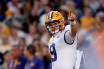 LSU quarterback Joe Burrow (9) warms up before an NCAA college football game against Florida in ...