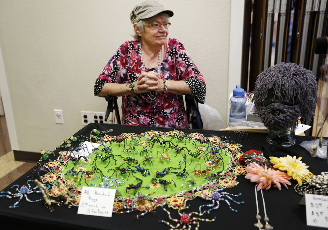 Karen Byrne, 74, of Third Eye Gifts in Las Vegas sells her beaded artworks during Mystic Fair a ...