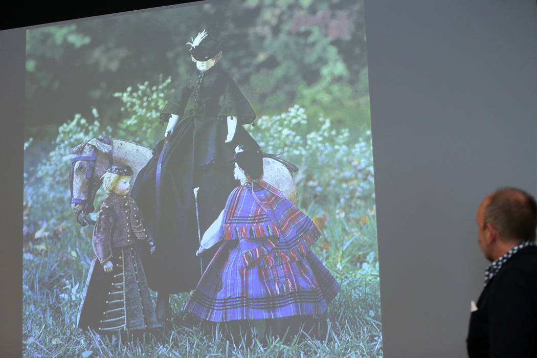Stuart Holbrook, president of Theriault's, gives a presentation on dolls during the Thirty Year ...