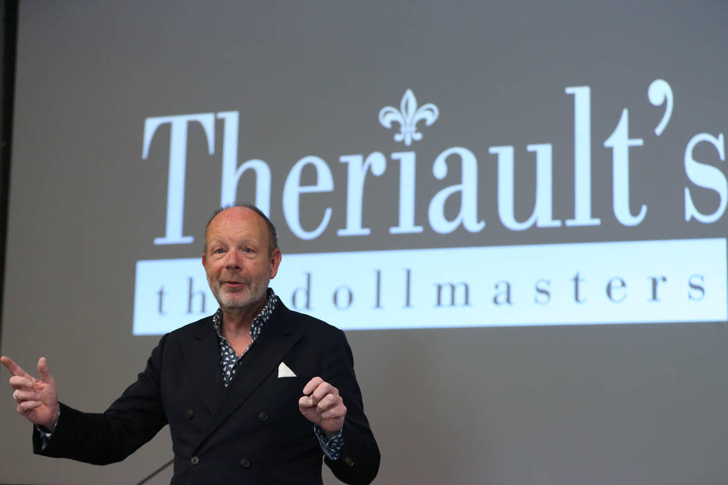 Stuart Holbrook, president of Theriault's, speaks during the Thirty Years a Doll Man event at t ...