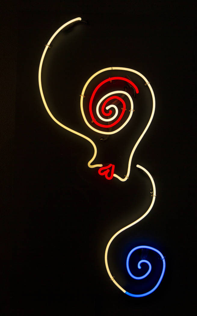Art piece "Spiral-Eyed Girl" by Tim Burton hangs in his Lost Vegas art exhibition at ...