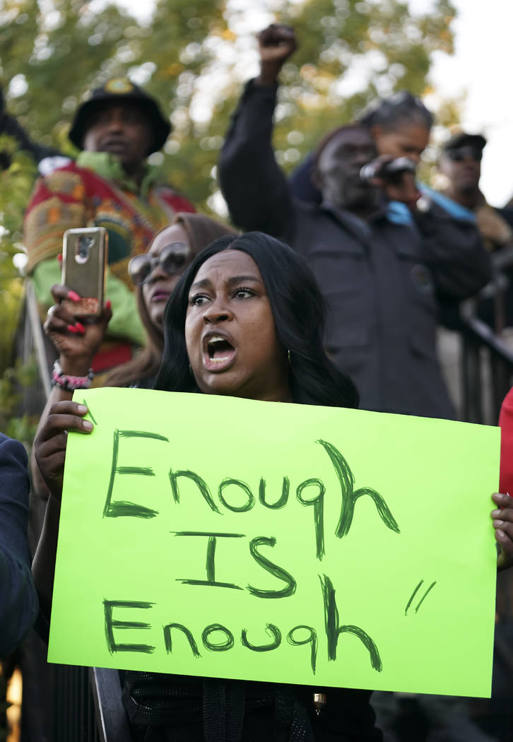 Carol Harrison-Lafayette protests the police shooting of Atatiana Jefferson during a community ...