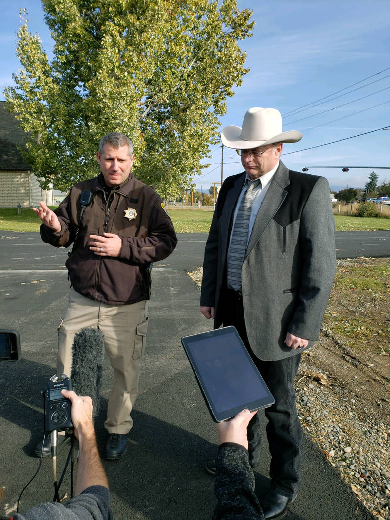 Lewis and Clark County Undersheriff Jason Grimmis, left, and Sheriff Leo Dutton, right, update ...