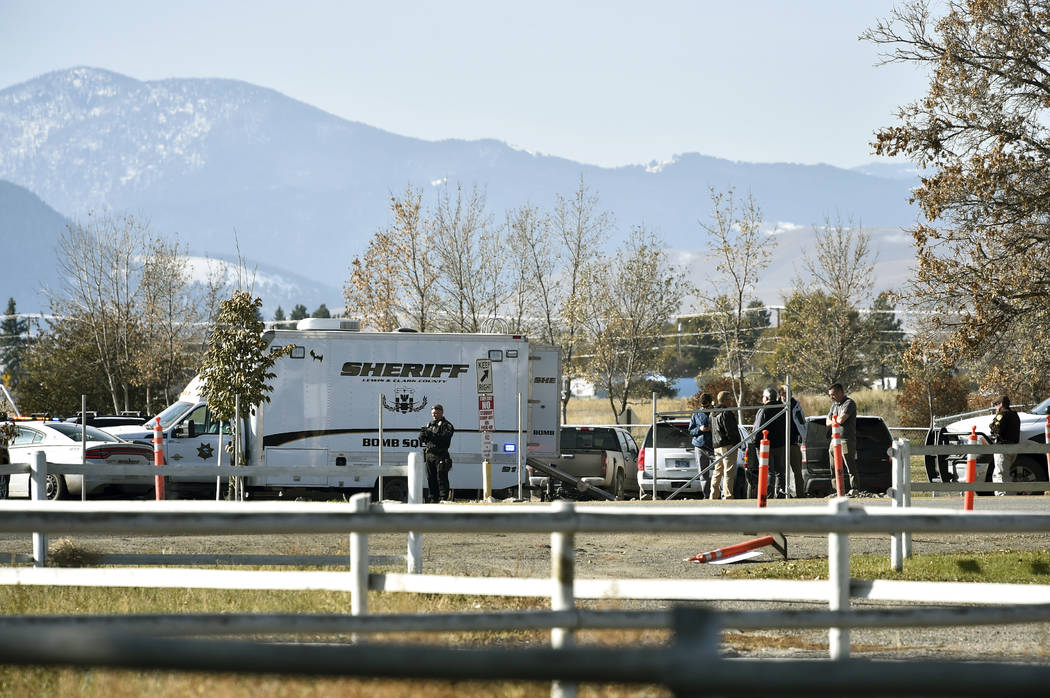 The Lewis and Clark County bomb squad works the scene at Rossiter Elementary school Tuesday, Oc ...