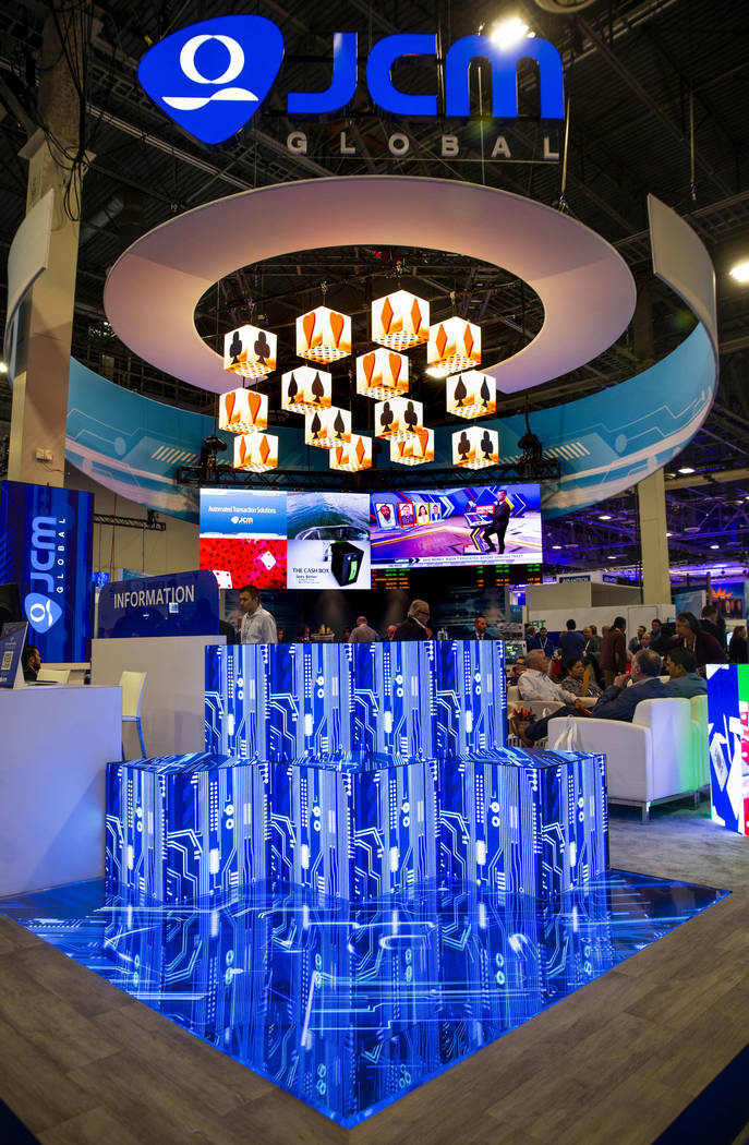 The JCM Global exhibition space promotes their transaction technologies expertise during the Gl ...