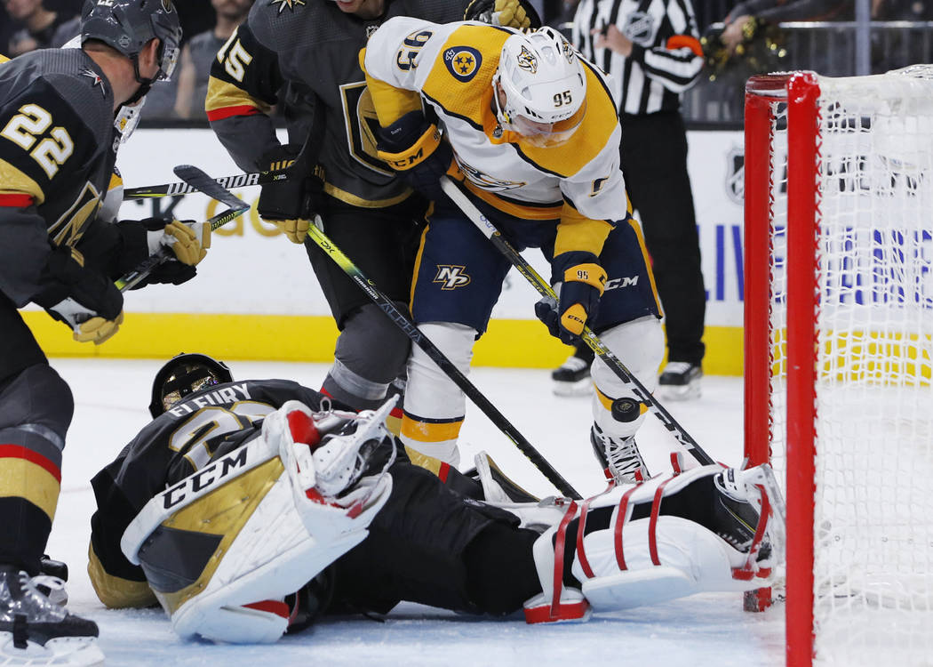 Nashville Predators center Matt Duchene (95) attempts a shot on Vegas Golden Knights goaltender ...