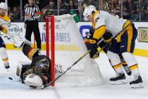 Vegas Golden Knights goaltender Marc-Andre Fleury blocks a shot by Nashville Predators center M ...