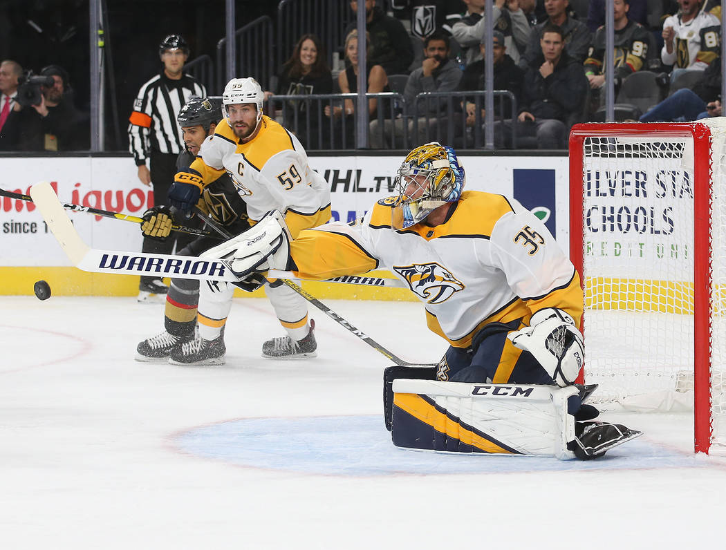 Nashville Predators goaltender Pekka Rinne (35) makes a save during the first period of their N ...