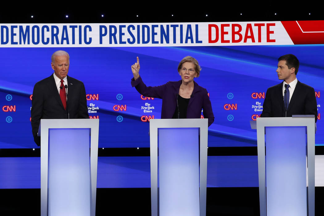 Democratic presidential candidate former Vice President Joe Biden, left, Sen. Elizabeth Warren, ...