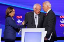 Democratic presidential candidate Sen. Kamala Harris, D-Calif., left, Sen. Bernie Sanders, I-Vt ...