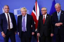 Britain's Brexit Secretary Stephen Barclay (from left), British Prime Minister Boris Johnson, E ...