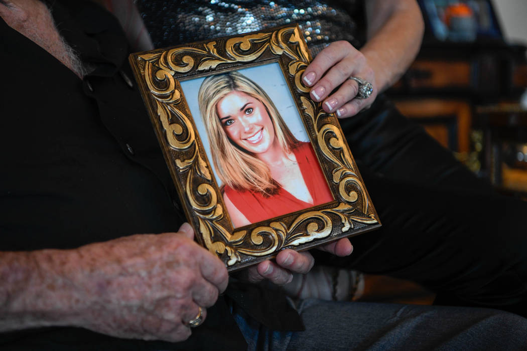 David and Jackie Siegel, hold a photo of their daughter at their home in Windermere, Fla., on O ...