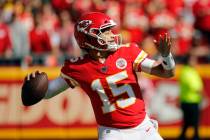 Kansas City Chiefs quarterback Patrick Mahomes (15) throws a pass during the first half of an N ...