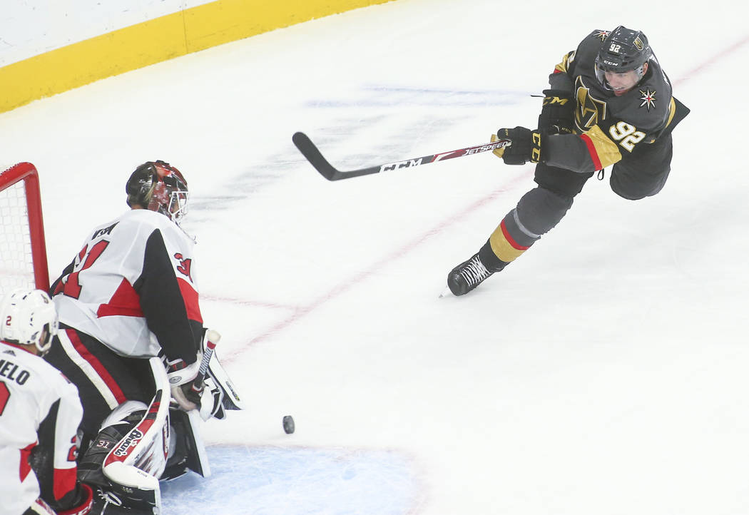 Ottawa Senators goaltender Anders Nilsson (31) blocks a shot from Golden Knights' Tomas Nosek ( ...