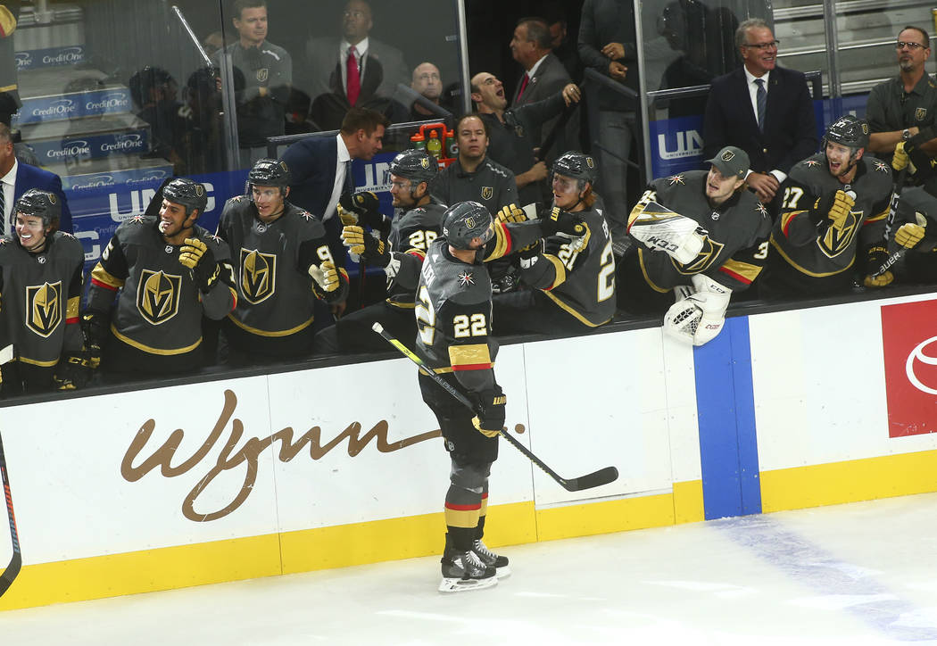 Golden Knights' Nick Holden (22) celebrates his goal against the Ottawa Senators during the fir ...