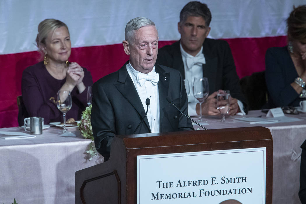 Former U.S. Secretary of Defense Jim Mattis, center, delivers the keynote address during the 74 ...