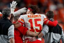 Kansas City Chiefs quarterback Patrick Mahomes (15) leaves the game after getting injured again ...