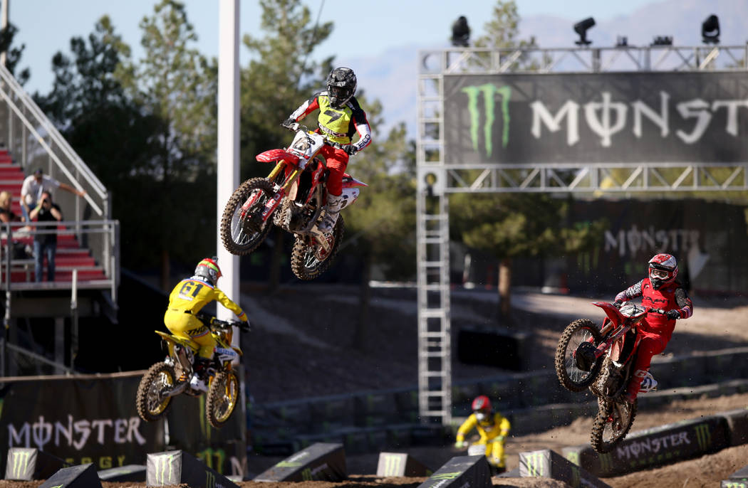 Supercross riders, including Jeremy Martin (6) of Tallahassee, Fla., make a test run at Sam Boy ...