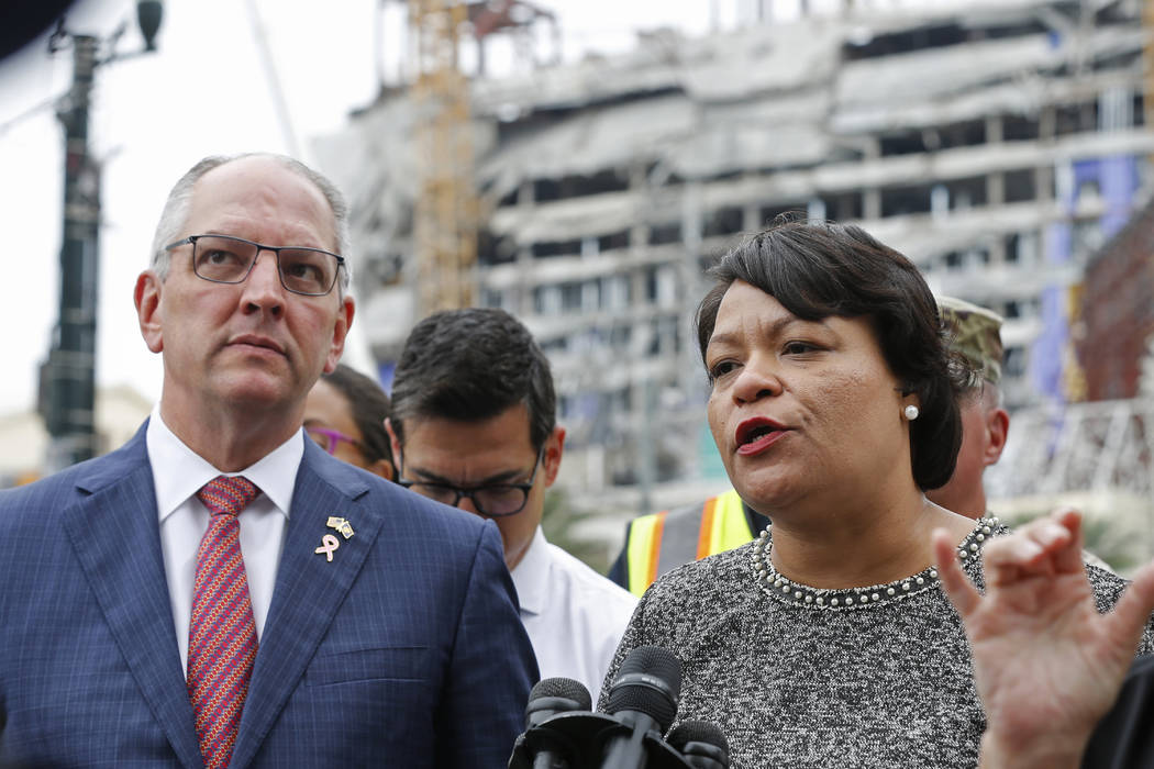 New Orleans Mayor Latoya Cantrell and Louisiana Gov. John Bel Edwards address reporters near th ...