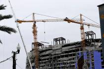 Two unstable cranes loom over the construction of a Hard Rock Hotel, Thursday, Oct. 17, 2019, i ...
