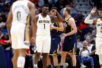 New Orleans Pelicans forward Zion Williamson (1) reacts after scoring a basket against the Utah ...