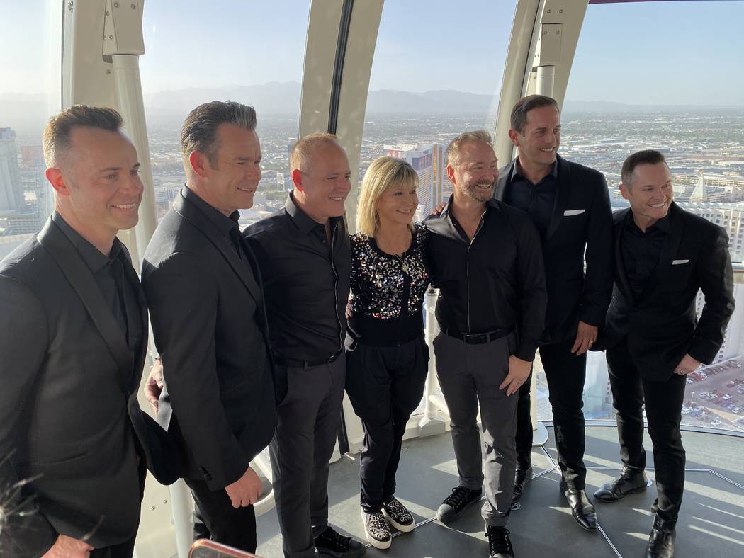 Michael Caprio and Randy Slovacek are shown with members of Human Nature and Olivia Newton-John ...