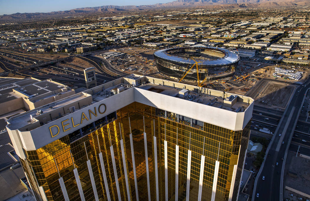The Delano, near, and the Raiders Allegiant Stadium construction site, above, on Wednesday, Oct ...