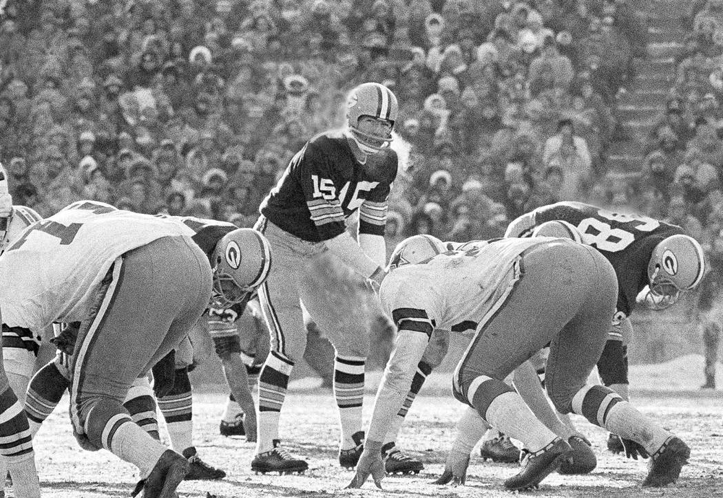 FILE - In this Dec. 31, 1967, file photo, Green Bay Packers quarterback Bart Starr calls signal ...
