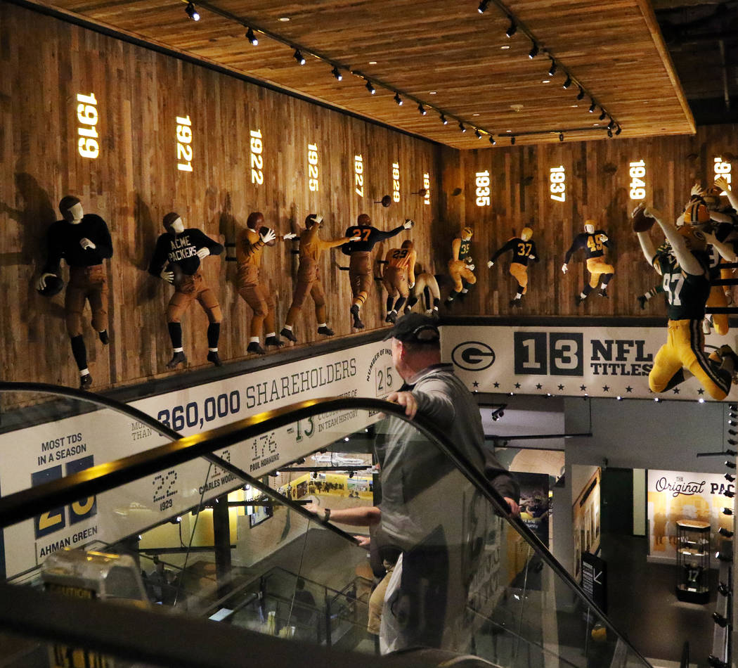 Fans explore Packer history inside the Green Bay Packers Hall of Fame